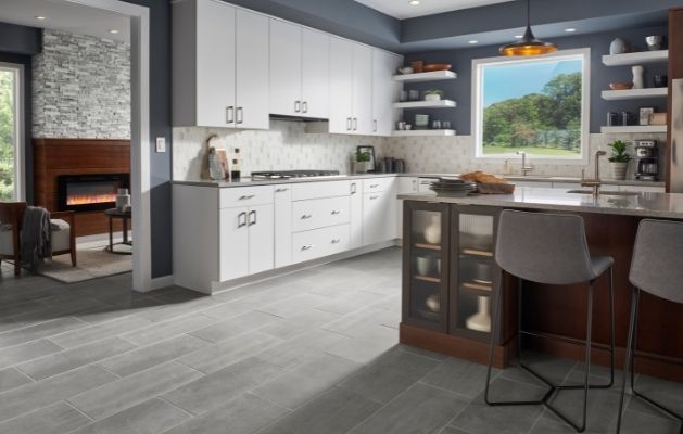 waterproof gray flooring in white kitchen